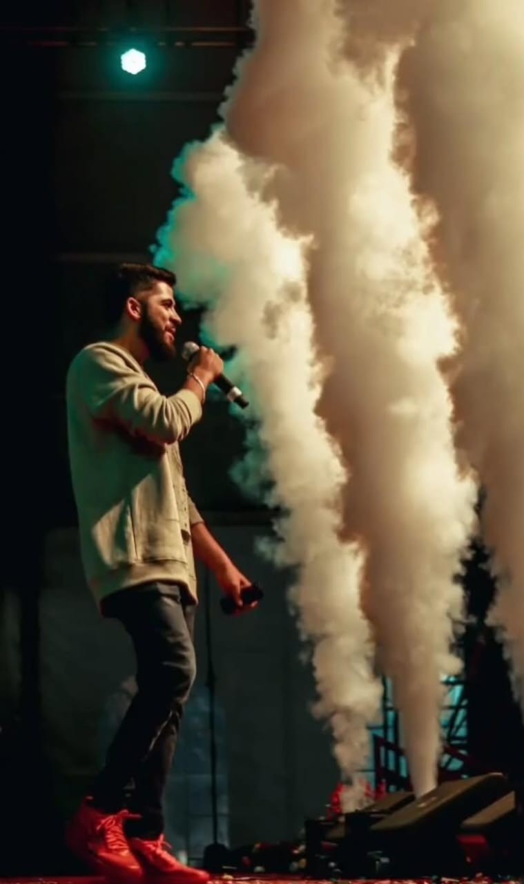 AJ on stage during a performance